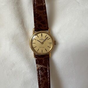 Omega De Ville Gold Watch with Textured Brown Strap
